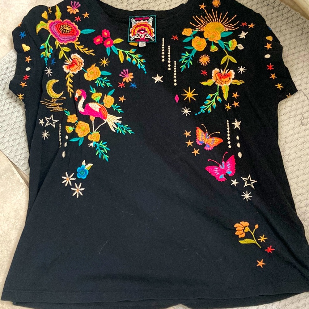 Johnny Was embroidered sleeveless 
You should try